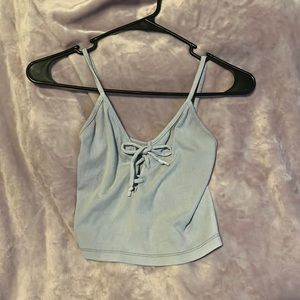 Pale blue tank top. Available for discount bundle with other qualifying items!
